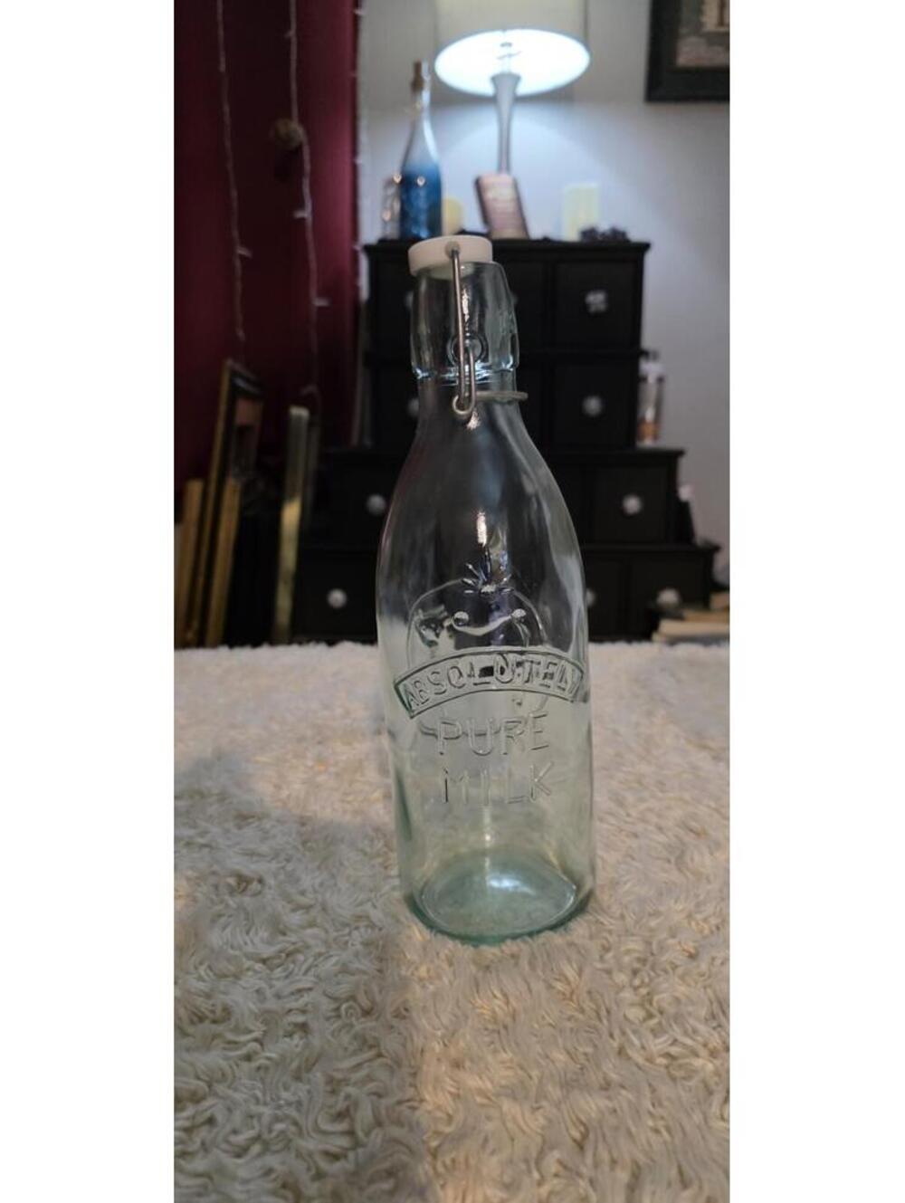 Vintage Glass Milk Bottle with Embossed Cow Design